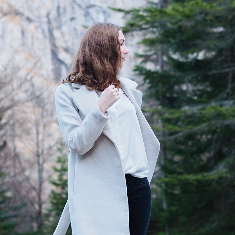 The casual light gray coat jacket is versatile and simple