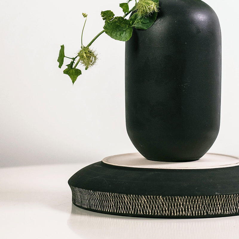 Retro ceramic vase in black minimalist style