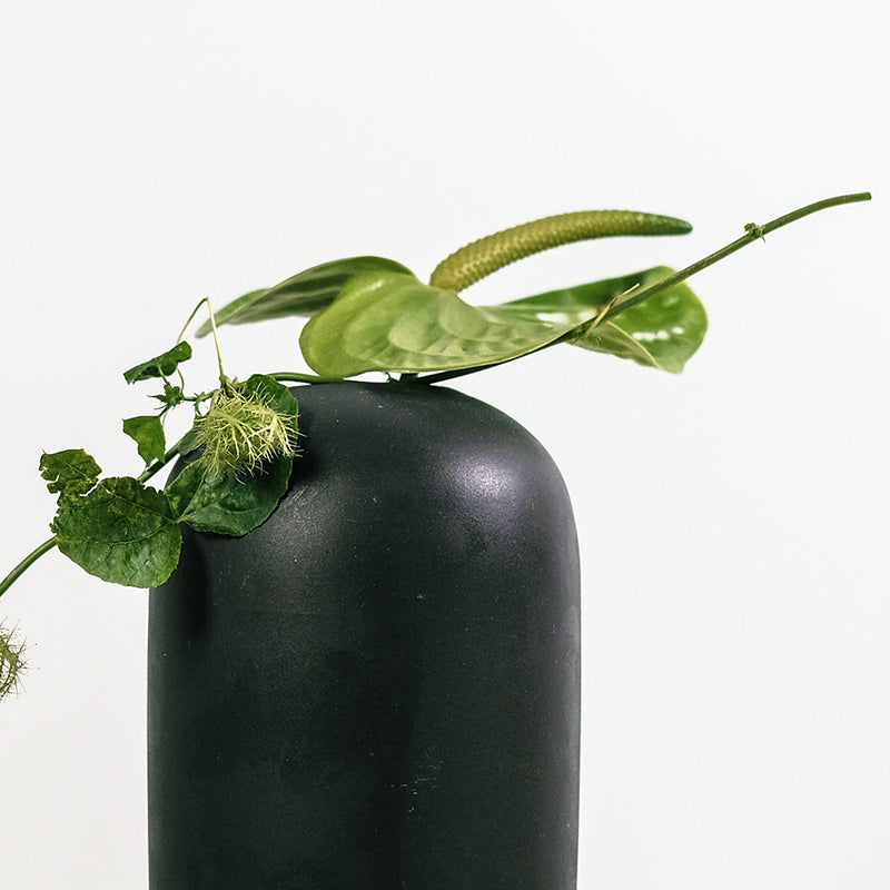 Retro ceramic vase in black minimalist style